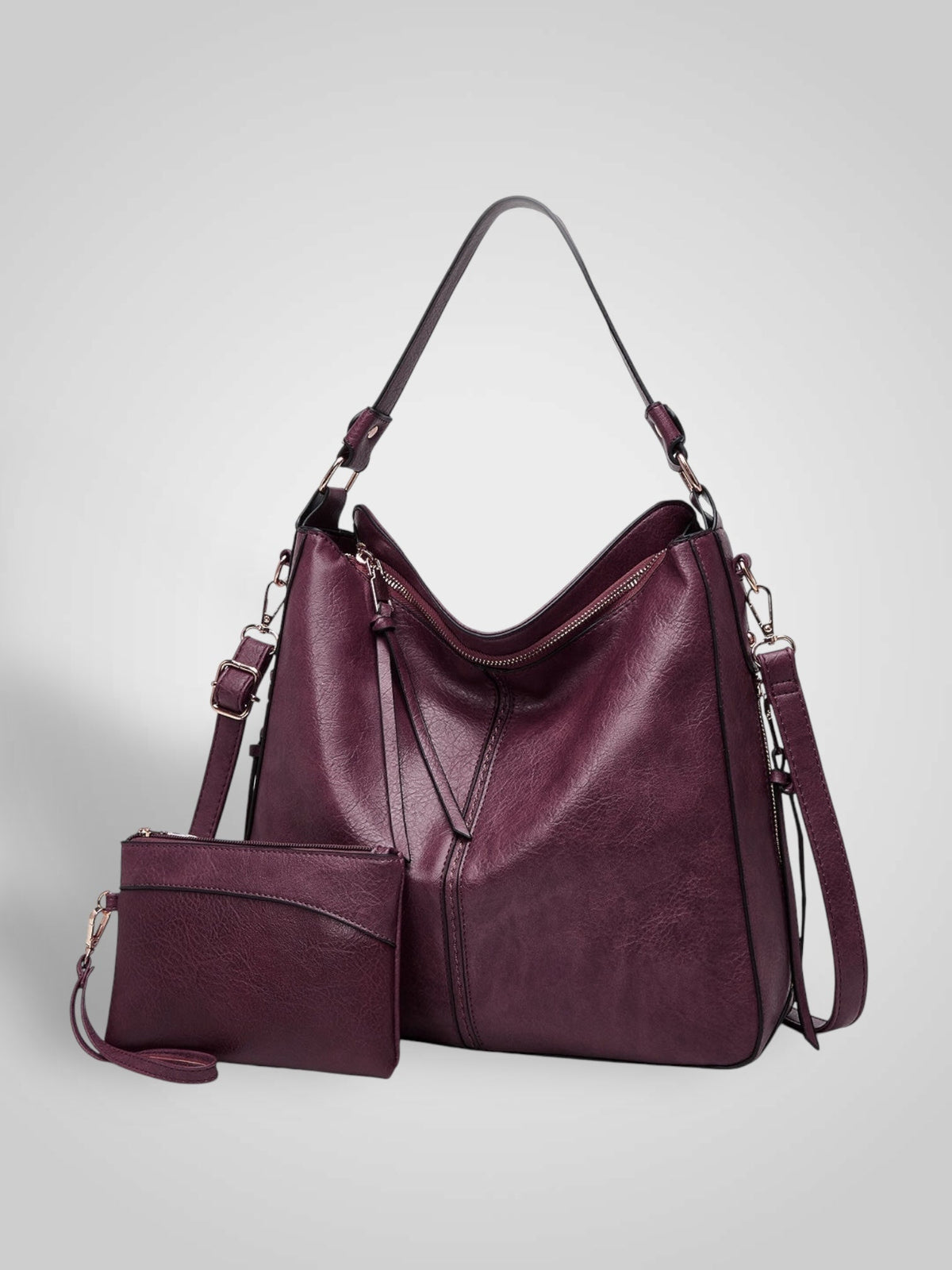 Widok z przodu z uchwytem górnym, ramiączkiem crossbody, górnym zamkiem i saszetką, kolor bordowy