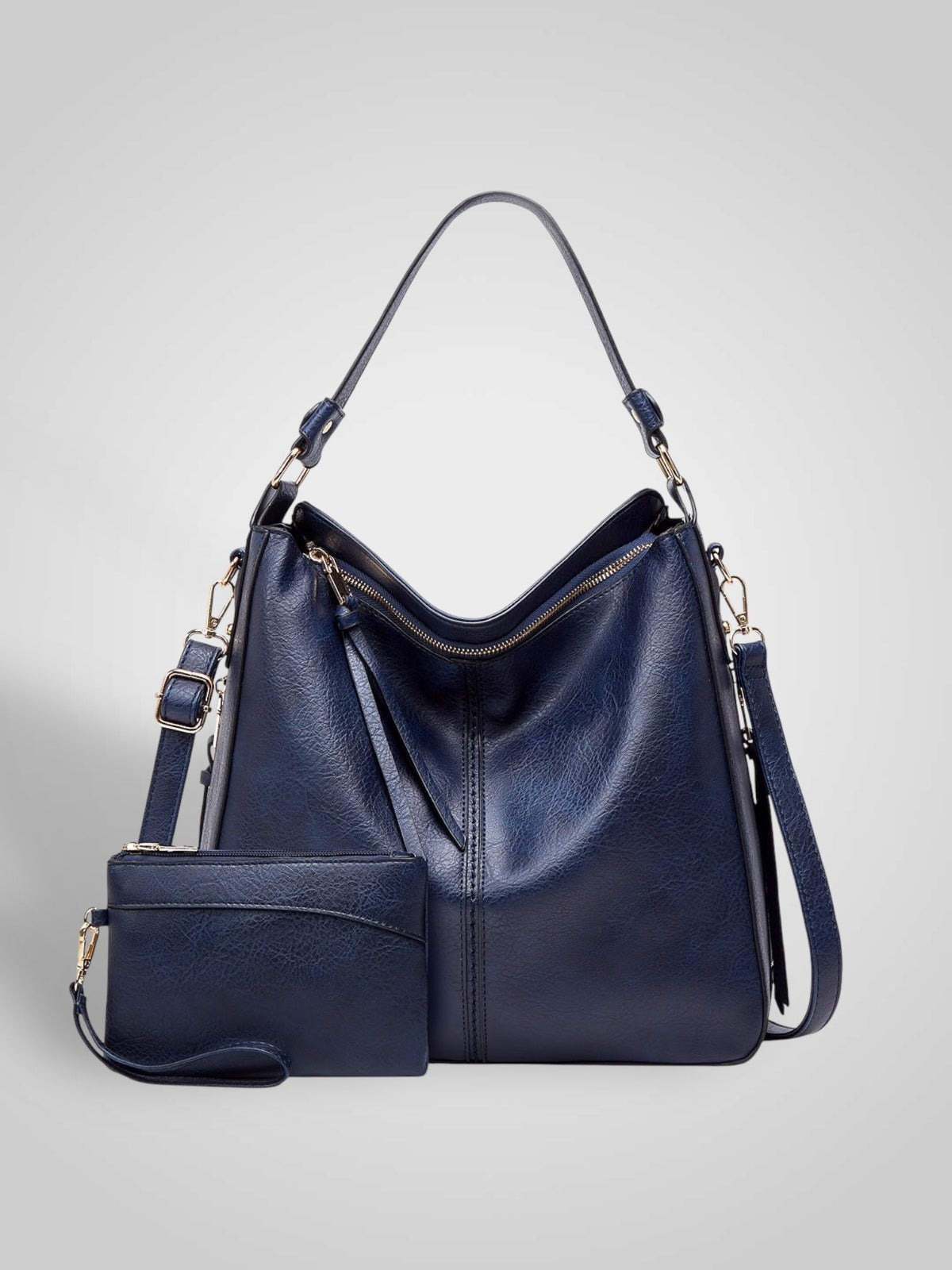 Widok z przodu z uchwytem górnym, ramiączkiem crossbody, górnym zamkiem i saszetką, kolor niebieski