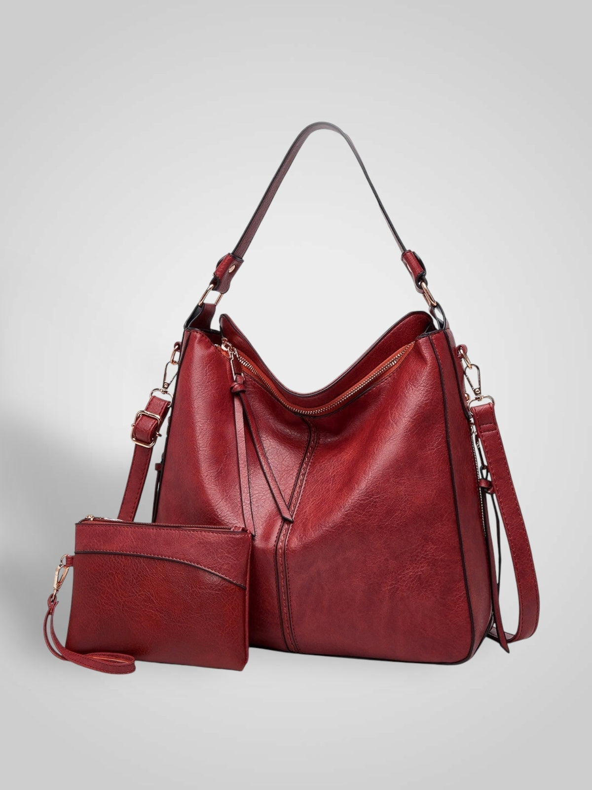 Widok z przodu z uchwytem górnym, ramiączkiem crossbody, górnym zamkiem i saszetką, kolor czerwony